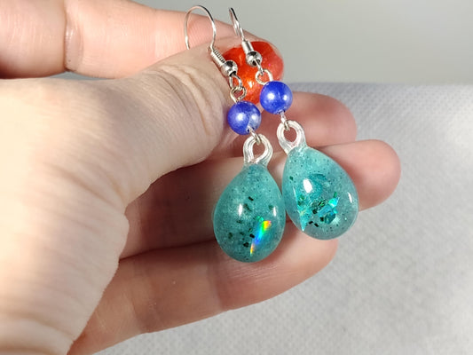 Blue resin earrings with holographic foil