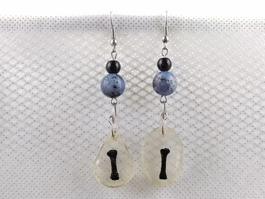 Long resin-encased bone earrings