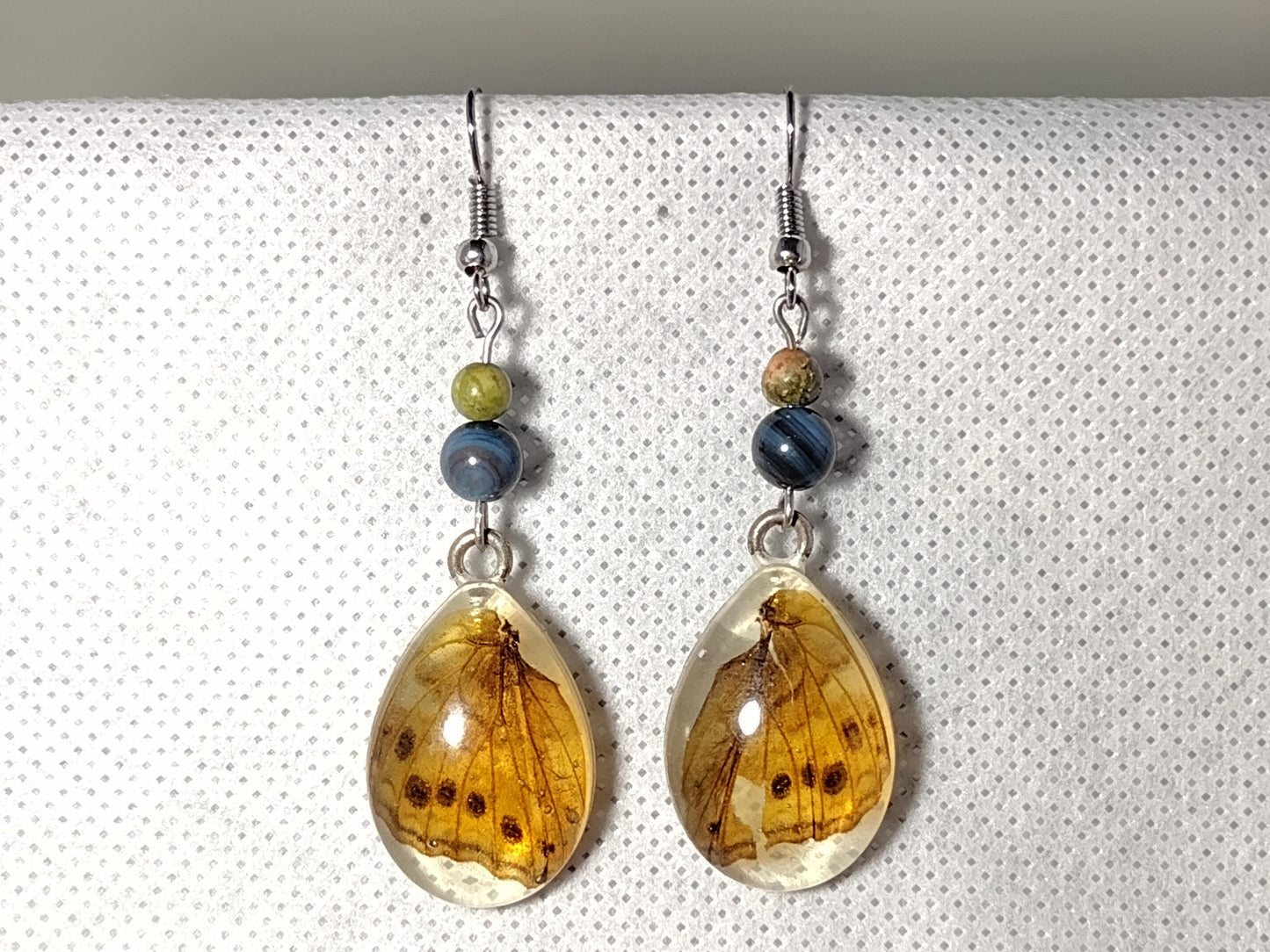 Long butterfly wing resin earrings