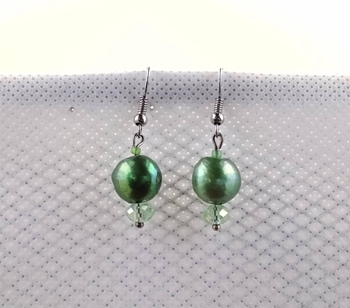Freshwater pearl dangle earrings with green glass beads