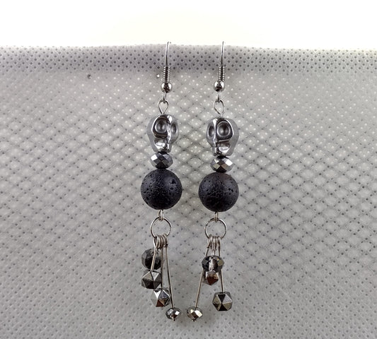 Silver skull dangle earrings with black lava rock beads
