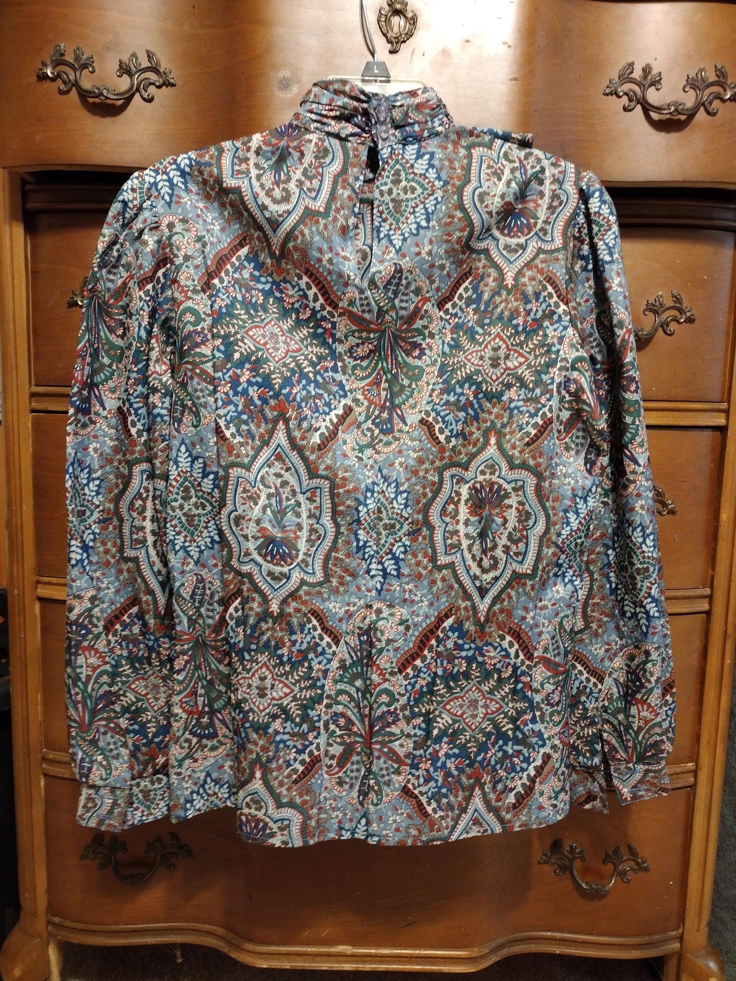 Vintage blue patterned long sleeve blouse with cravat/ruffle