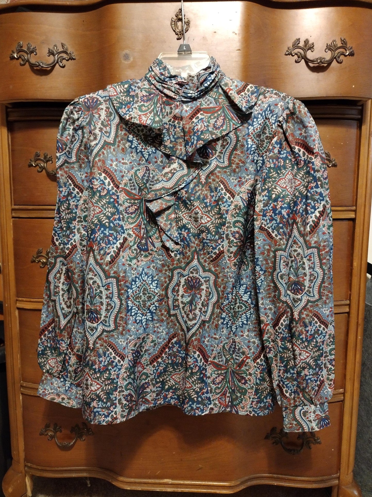 Vintage blue patterned long sleeve blouse with cravat/ruffle