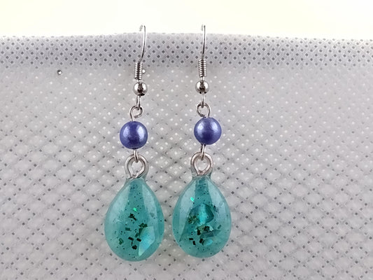 Blue resin earrings with holographic foil